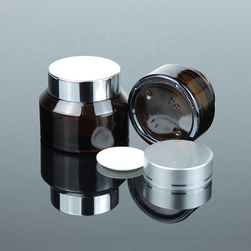 Factory Price 2 oz 60ml Clear Round Bottom Cosmetic Glass Jar with Black Lid (GJM45)