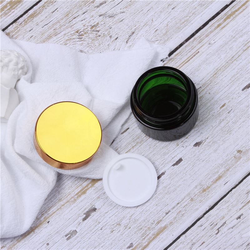 Factory Price Empty Green Color Glass Jars For Eye Or Face Cream Cosmetic Jars With Plastic Lids