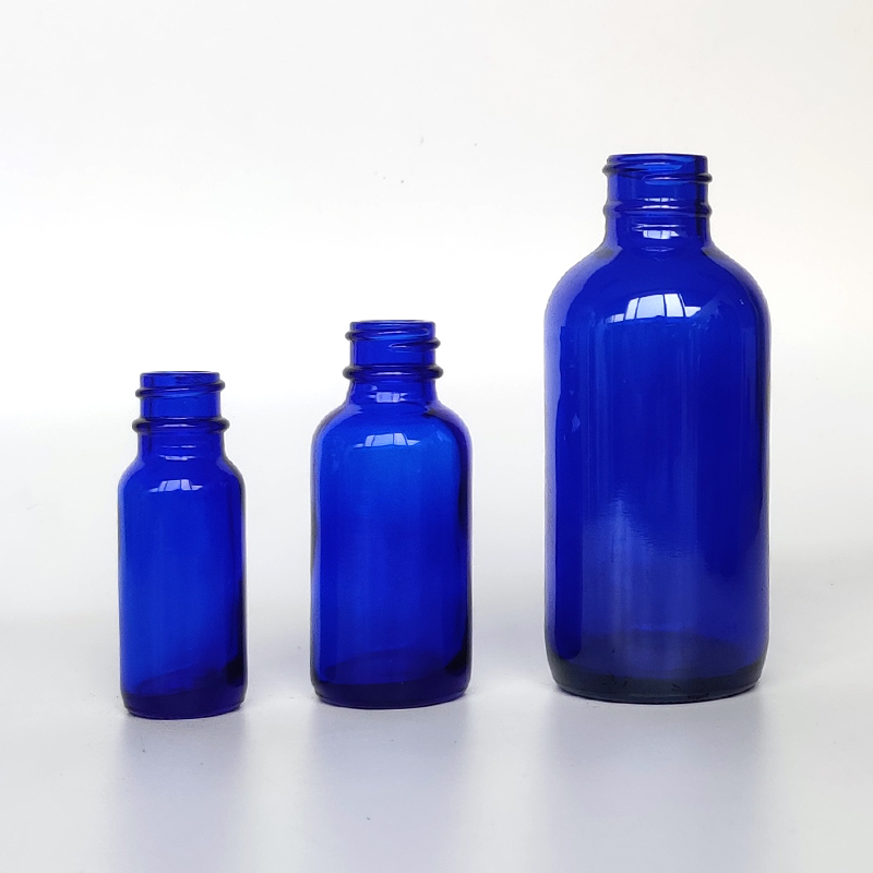 Factory Supply High Quality 2oz blue Glass Boston Round Bottle