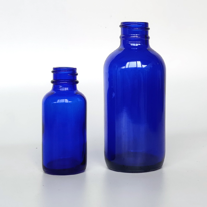Factory Supply High Quality 2oz blue Glass Boston Round Bottle