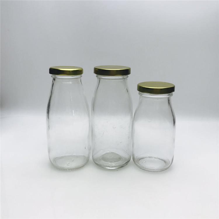 Factory direct classic 200ml 250ml 500ml 1 liter empty glass milk bottle with metal lid