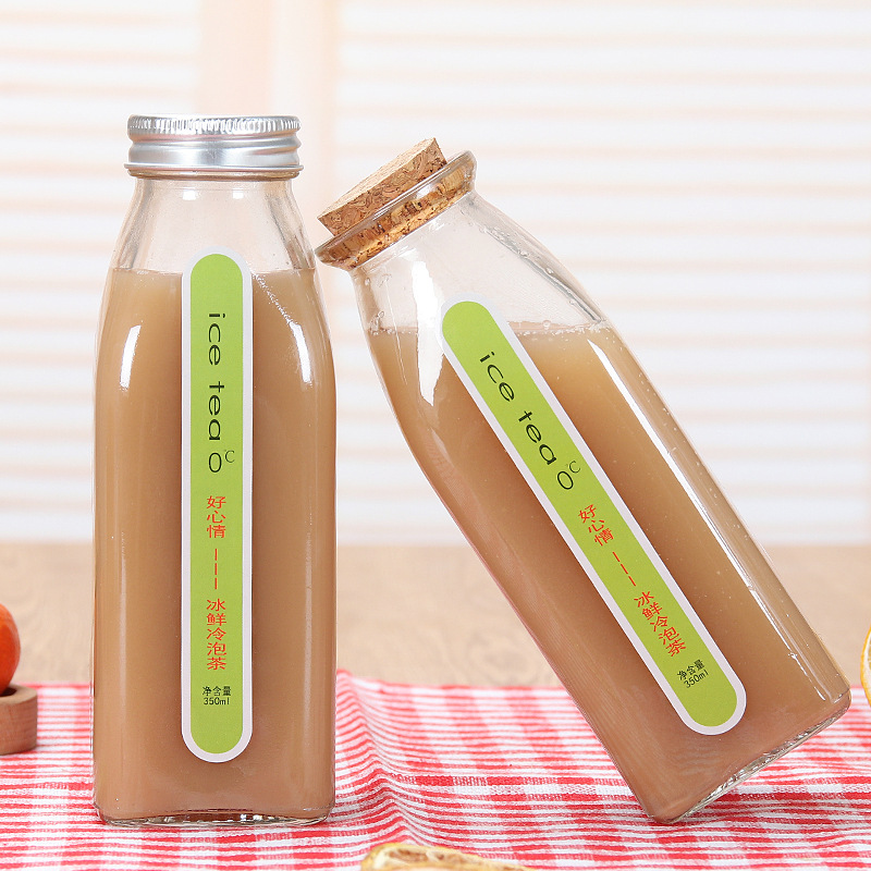 Factory direct custom beverage packaging bottle glass 100ml 150ml 350ml cork cap seal transparent milk juice bottle