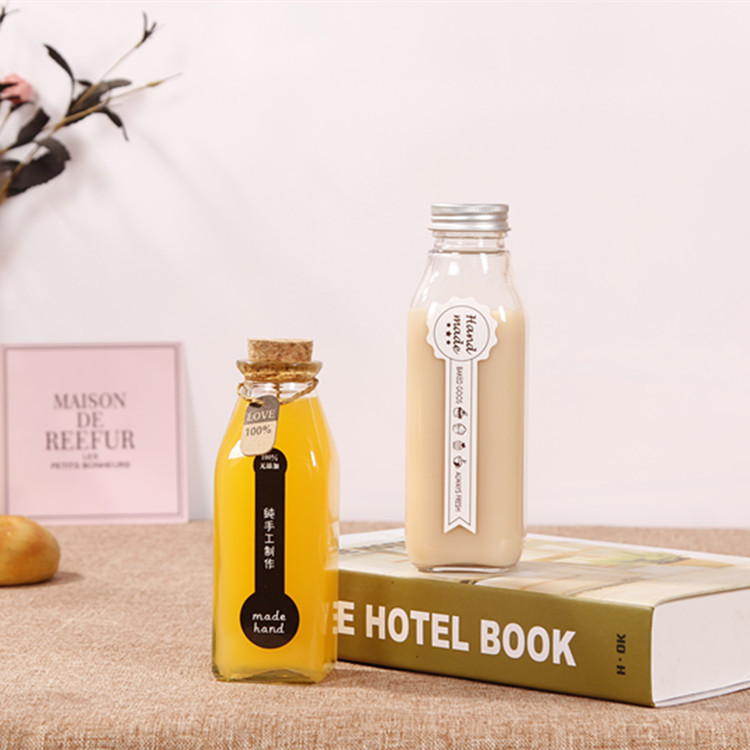Factory direct custom beverage packaging bottle glass 100ml 150ml 350ml cork cap seal transparent milk juice bottle