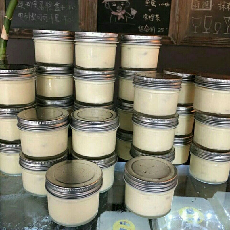 Factory direct sale cylindrical glass bottle with aluminum lid transparent pickle jar honey sealed jar