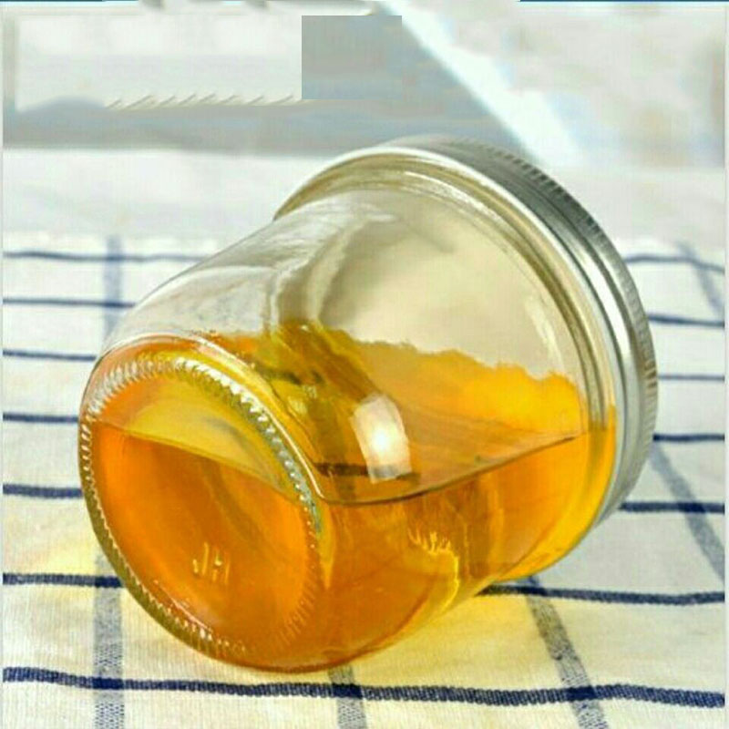 Factory direct sale cylindrical glass bottle with aluminum lid transparent pickle jar honey sealed jar