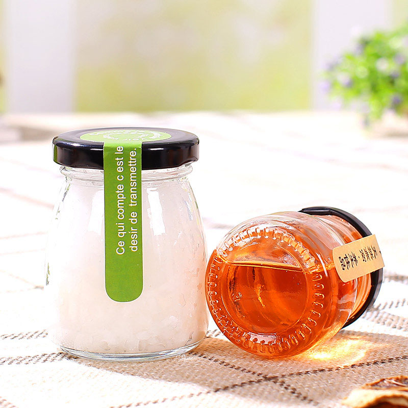 Factory direct sale glass patch bird's nest with lid empty honey bottle