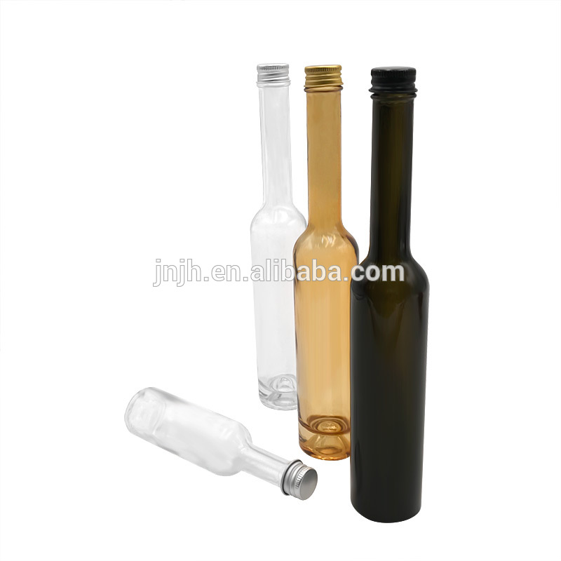Factory direct sale long neck screw cap transparent glass bottle
