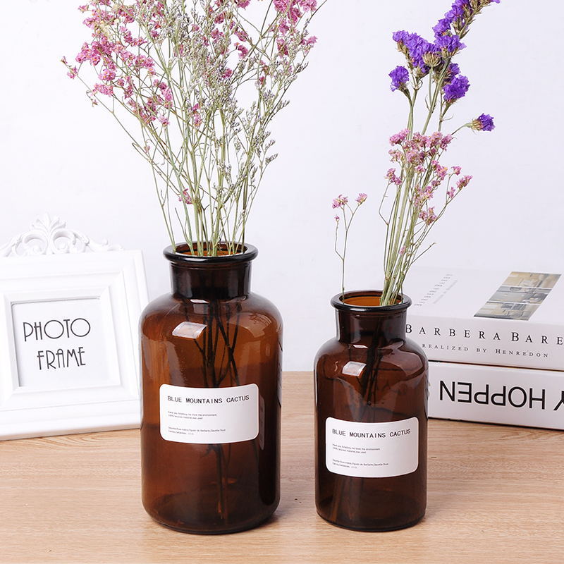 Factory direct sale transparent and brown glass jar decorative aromatherapy bottle