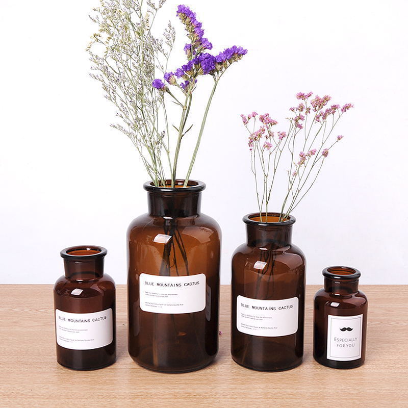 Factory direct sale transparent and brown glass jar decorative aromatherapy bottle