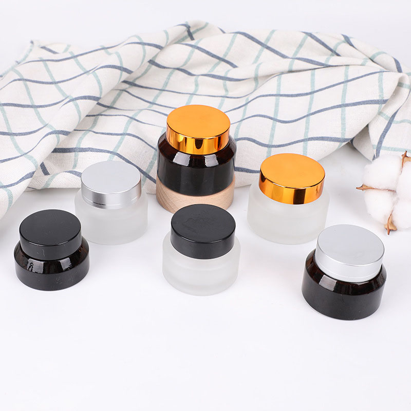 Factory direct sale variety of glass jars with caps, brown and frosted cream jars