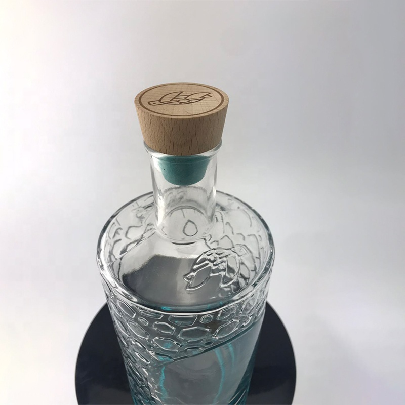 Factory direct sales embossed blue turtle 700ml glass gin bottle in gradient color paint
