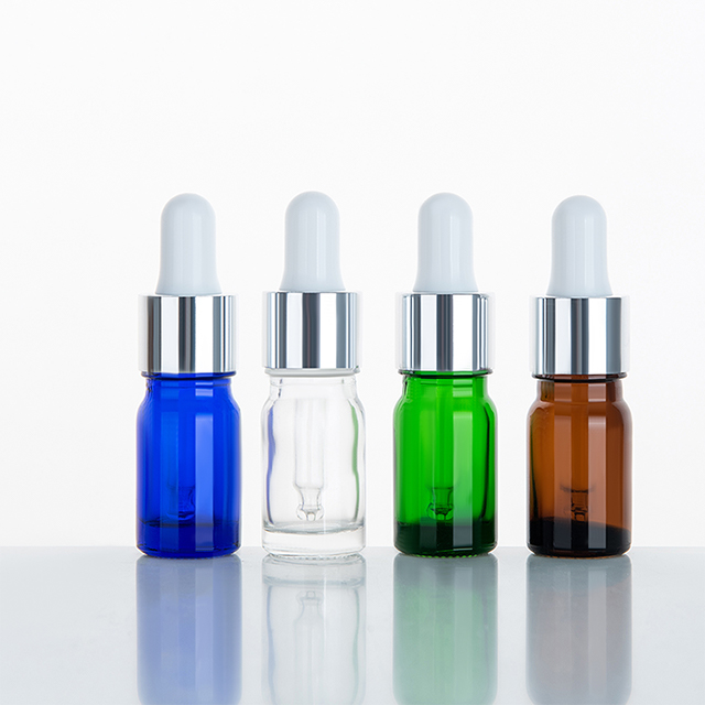 Factory hot sale 5ml 15ml 20ml 30ml 50ml dropper 10ml golden essential oil bottle pendant