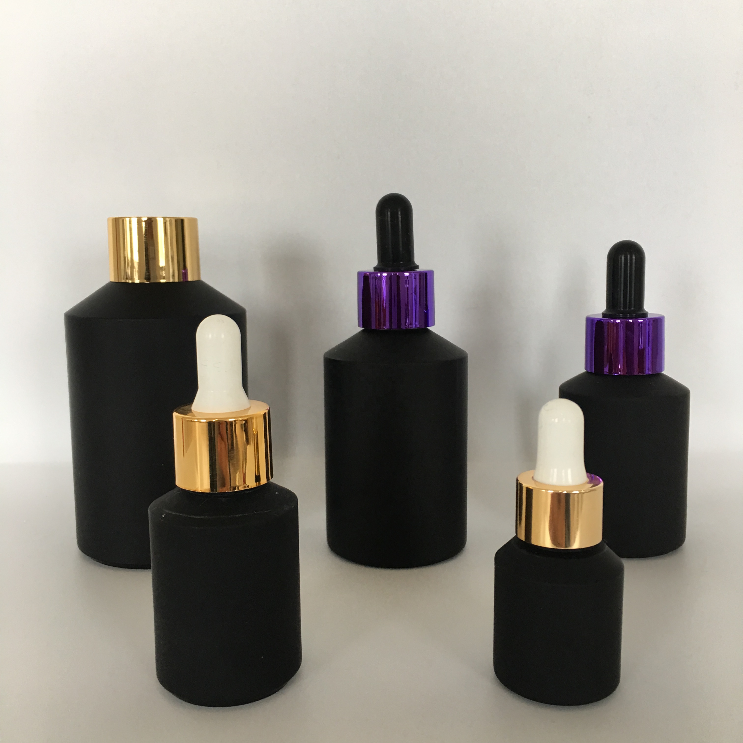 Factory hot sale cosmetic bottle jar packaging series frosted black slant shoulder glass lotion bottle with gold lid