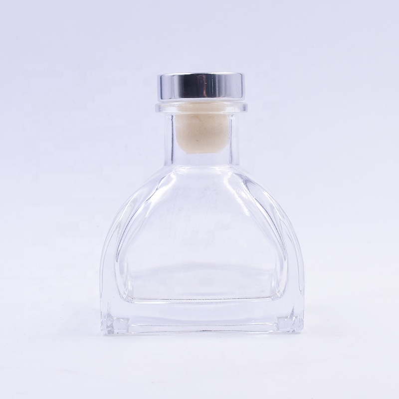 Factory-price  200 ml clear ger shape perfume aromatherapy glass bottle with cork