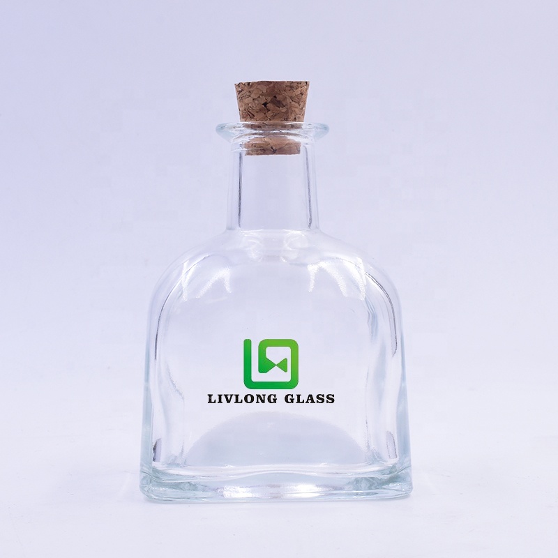 Factory-price 200 ml clear ger shape perfume aromatherapy glass bottle with cork