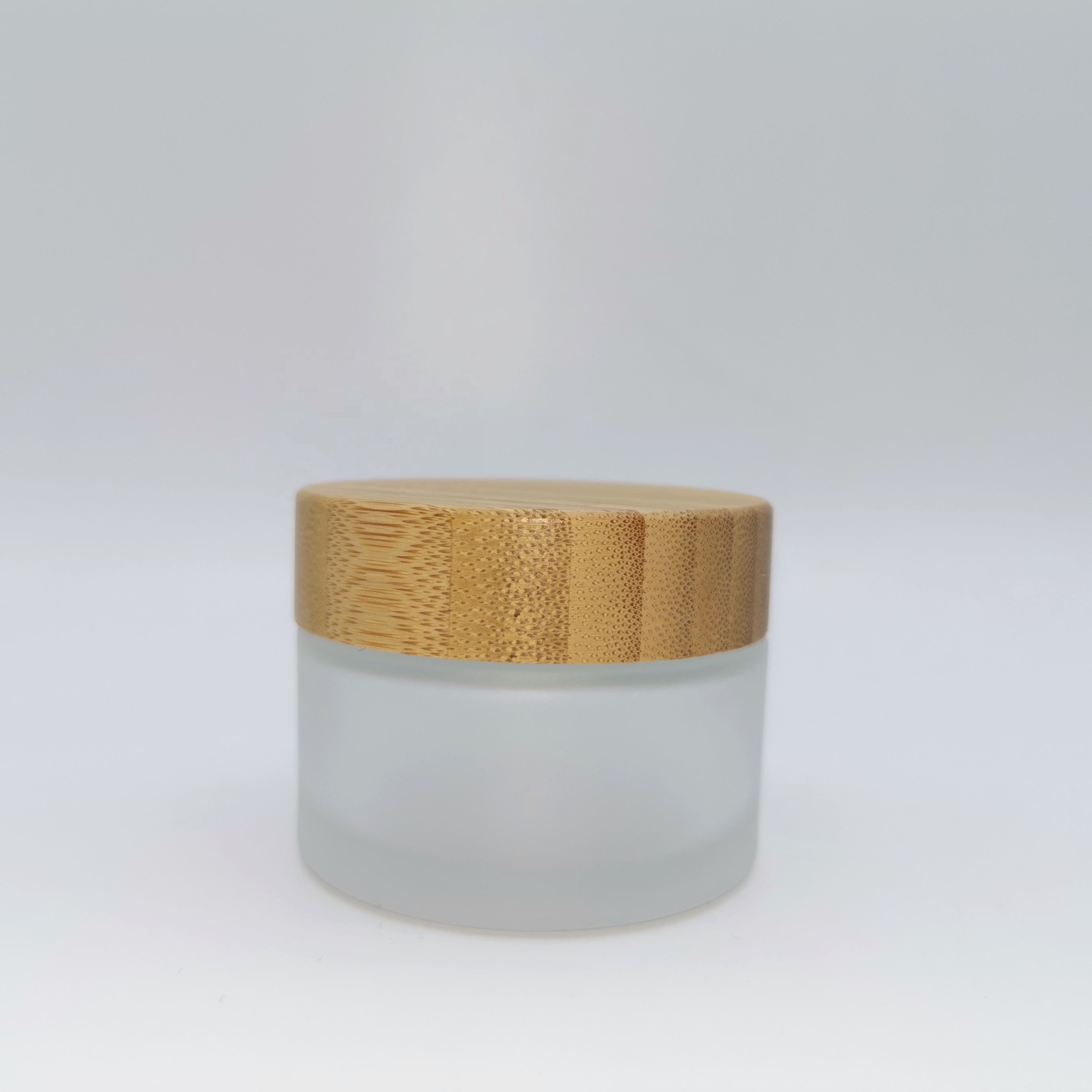 Factory price cosmetic containers frosted cream glass jar with bamboo lid