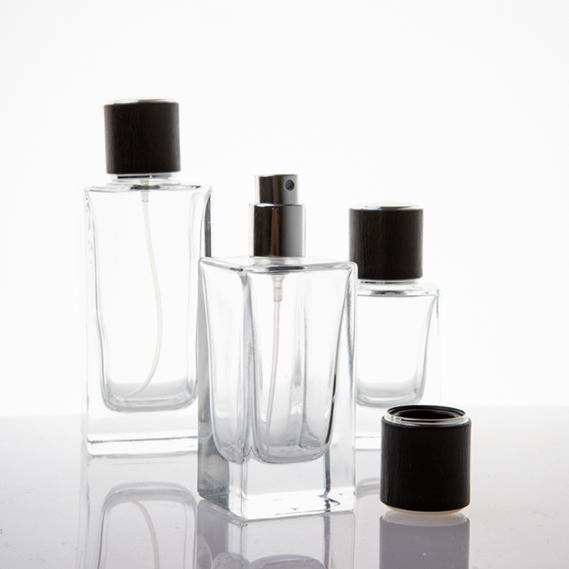 Factory price custom luxury matte black 100ml refillable glass men perfume bottle