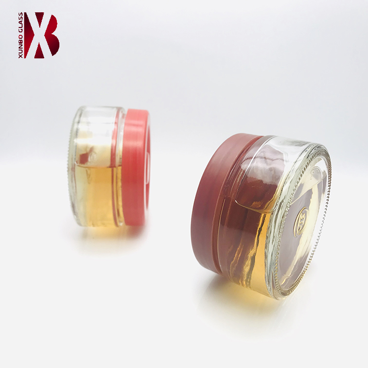 Factory price flat round shape 200 ml glass maple syrup jar with plastic lid