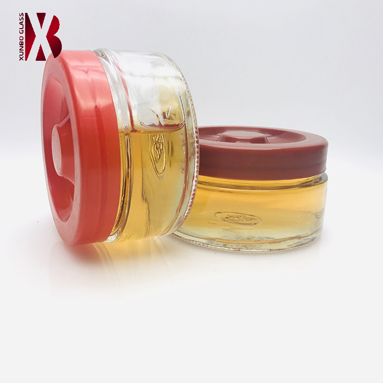 Factory price flat round shape 200 ml glass maple syrup jar with plastic lid