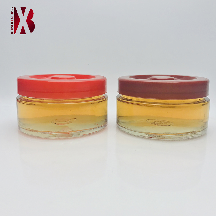 Factory price flat round shape 200 ml glass maple syrup jar with plastic lid