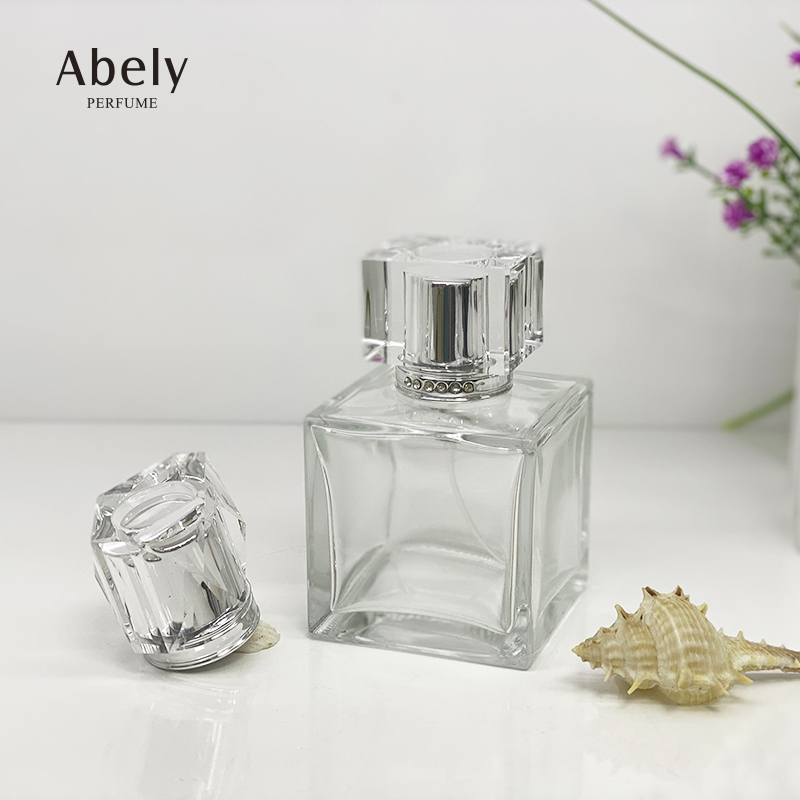 Factory price wholesale 100ml empty perfume glass bottle with perfume acrylic lids in stock