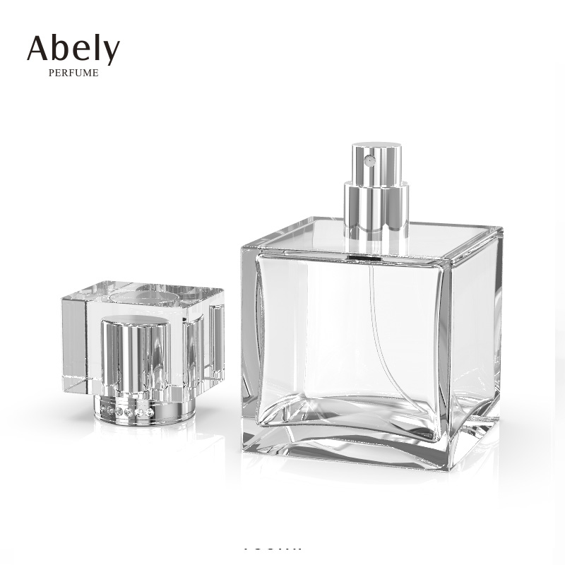 Factory price wholesale 100ml empty perfume glass bottle with perfume acrylic lids in stock