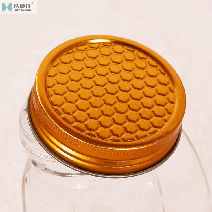 Factory sale 380ml 730ml hexagonal glass jar with tinplate lid for honey