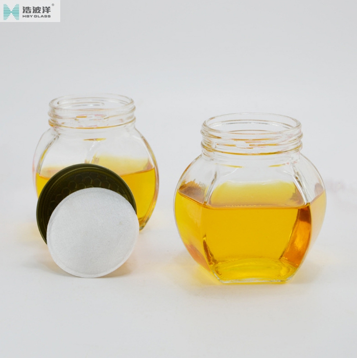Factory sale 380ml 730ml hexagonal glass jar with tinplate lid for honey