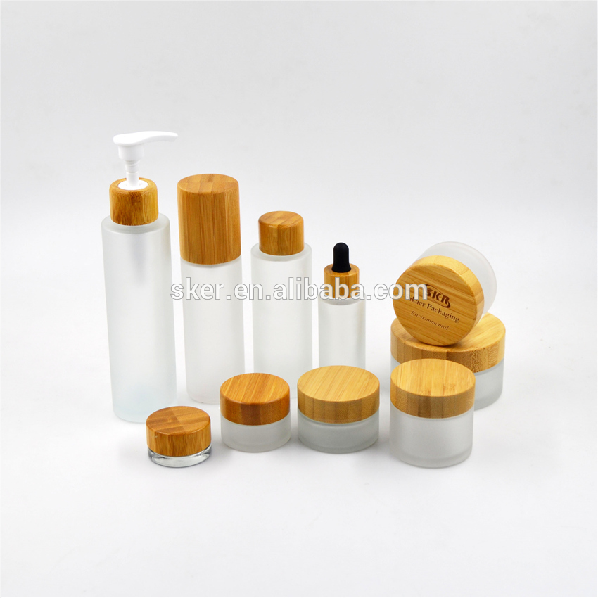 Factory sale perfume bottles 50ml 100ml 150ml Frost glass lotion bottle with bamboo mist sprayer/bamboo lotion pump/bamboo cap