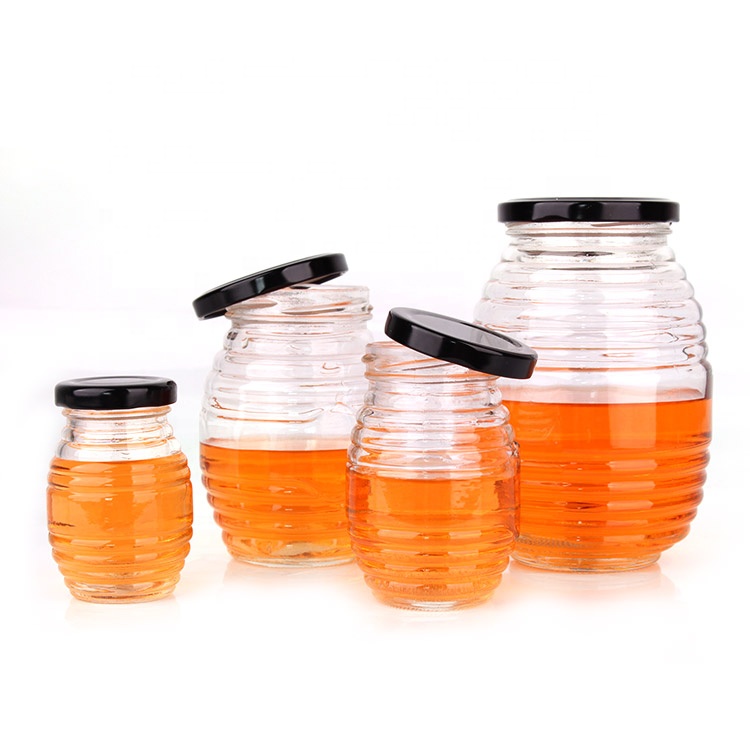 Factory sell stock empty 100ml bee honey glass jar for storage with metal twist off cap