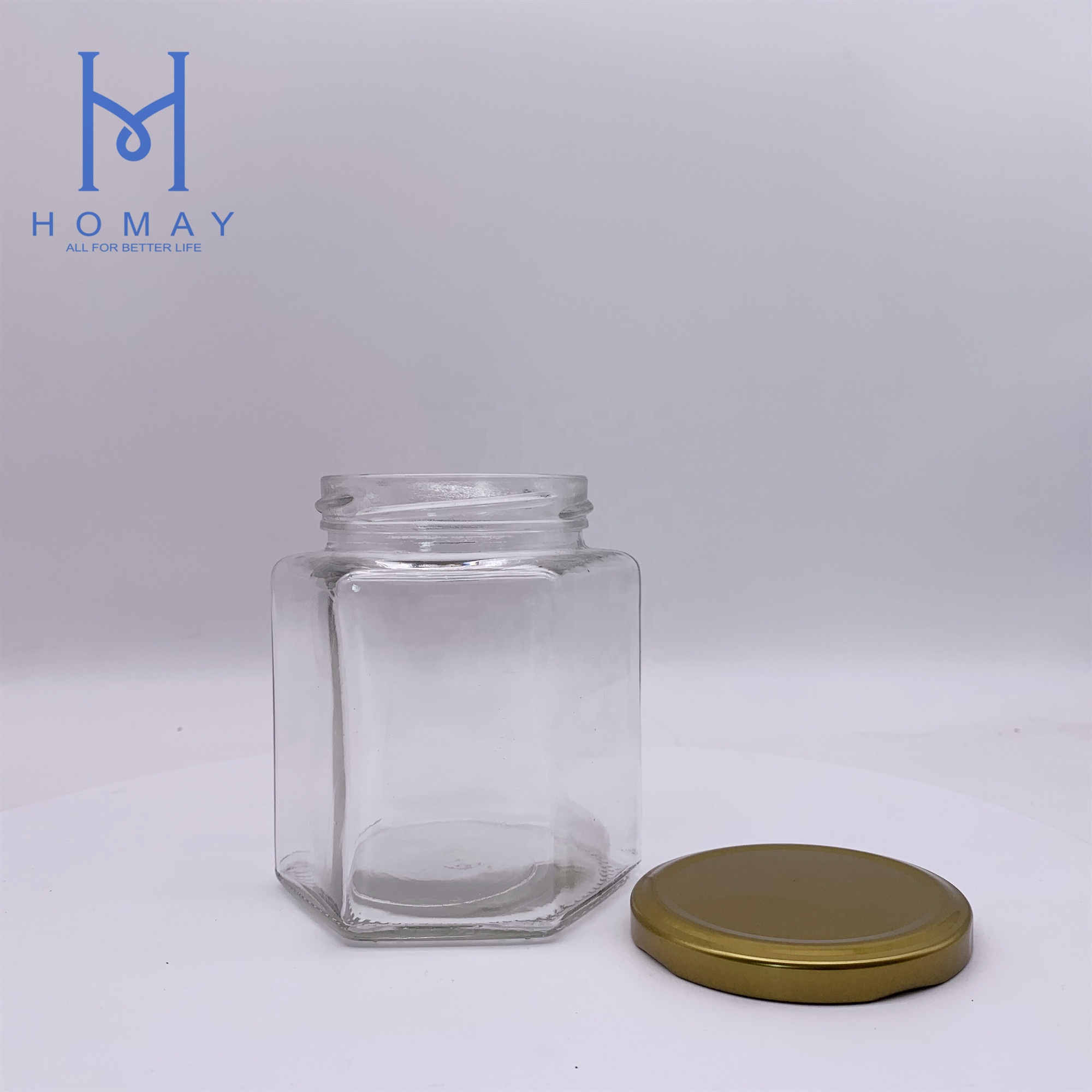 Factory selling 500ml hexagonal glass food storage jar with cap