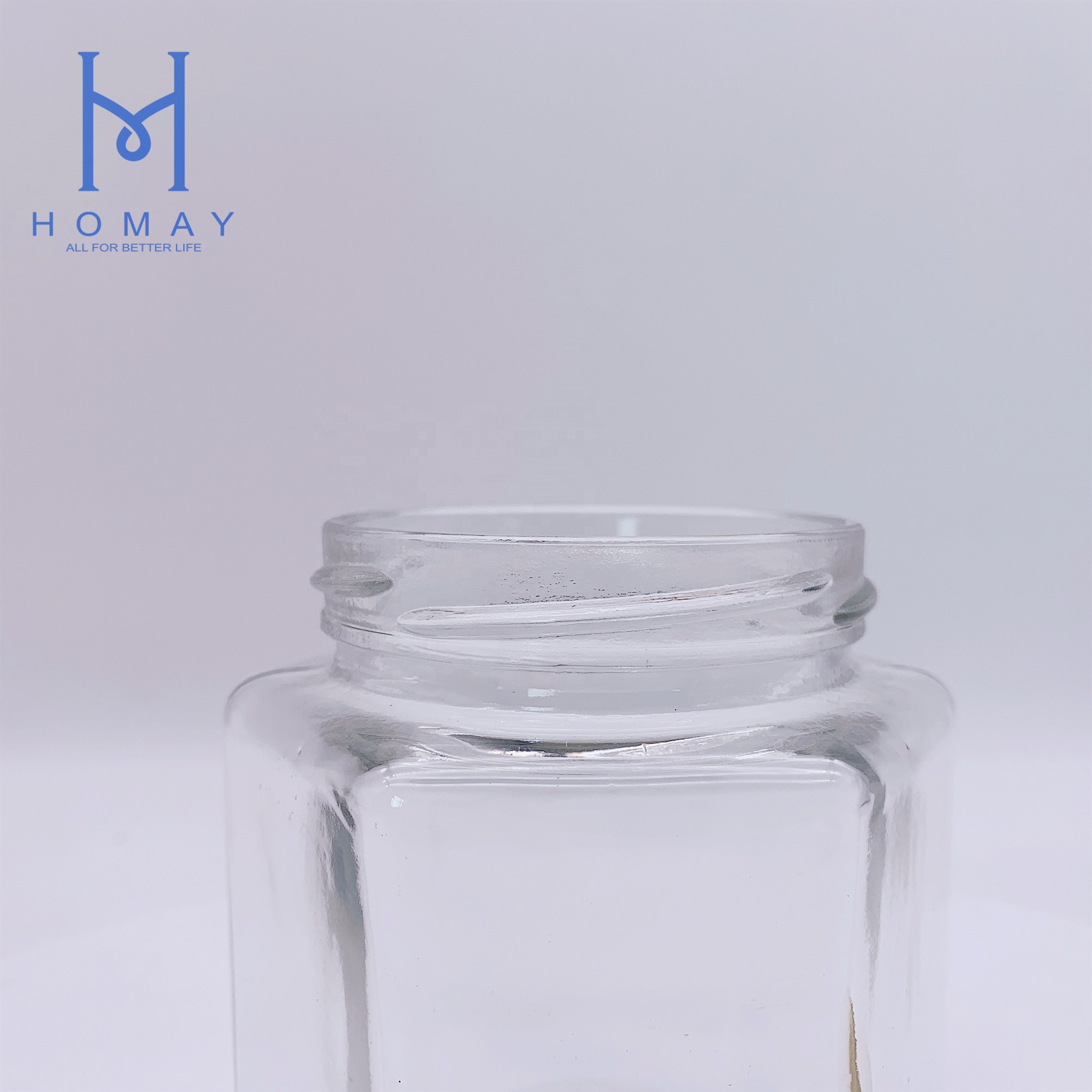 Factory selling 500ml hexagonal glass food storage jar with cap