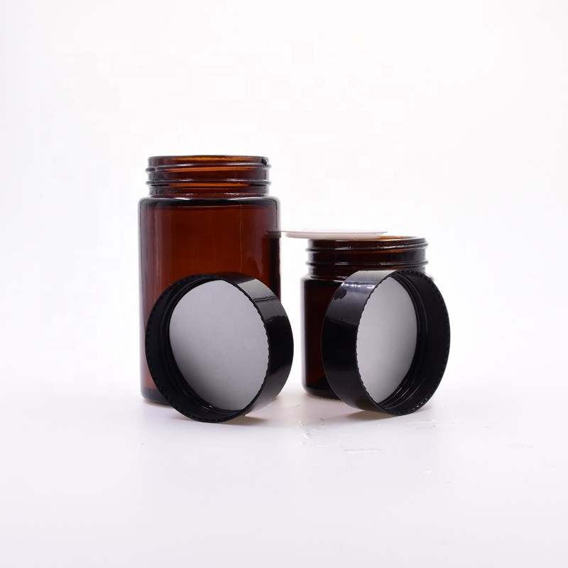 Factory smooth primary color amber round 100ml 120ml 180ml glass bottle sauce empty flower packaging glass jar with pp black lid