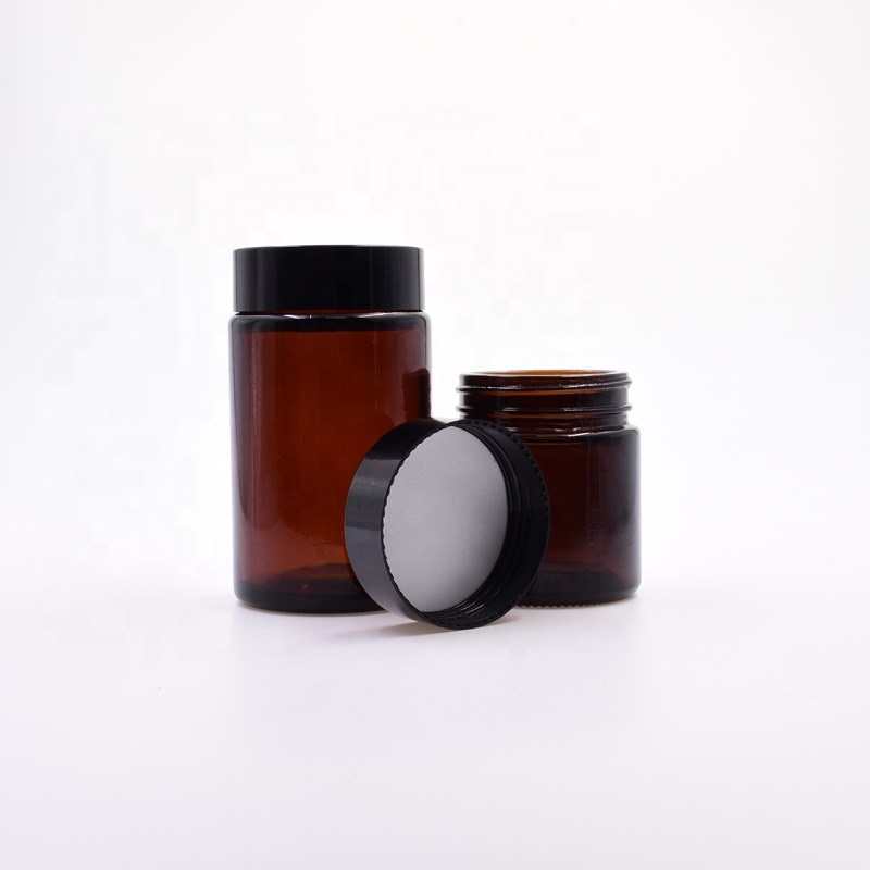 Factory smooth primary color amber round 100ml 120ml 180ml glass bottle sauce empty flower packaging glass jar with pp black lid