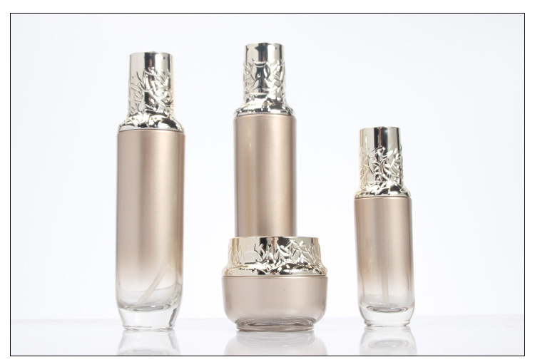 Factory supply new design 120ml 100ml 40ml 50g golden glass bottles and jars with carved cap cosmetic container package