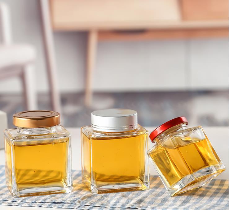 Factory wholesale 350ml glass honey bottle with wooden lids for storage