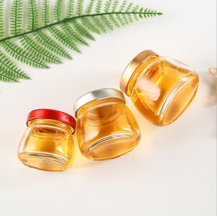 Factory wholesale 350ml glass honey bottle with wooden lids for storage