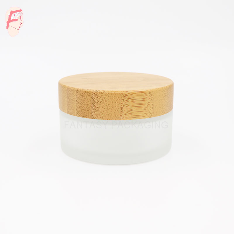 Factory wholesale Fantasy made 100ml frosted matt bamboo lid glass jar 100g cosmetic usage cream container glass bottle