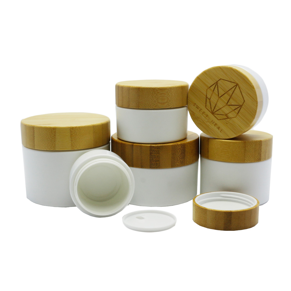Factory wholesale cosmetic glass pump bottle cream jar black glass jar bamboo cap BP-335K