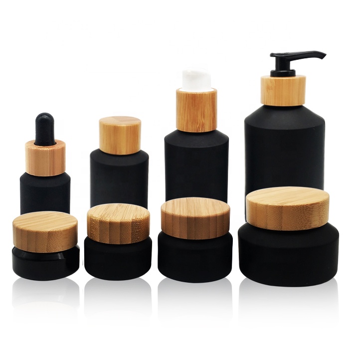 Factory wholesale cosmetic wooden lid glass cream jar glass black frosted cream jar with 100% nature bamboo cap