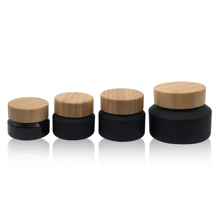 Factory wholesale cosmetic wooden lid glass cream jar glass black frosted cream jar with 100% nature bamboo cap