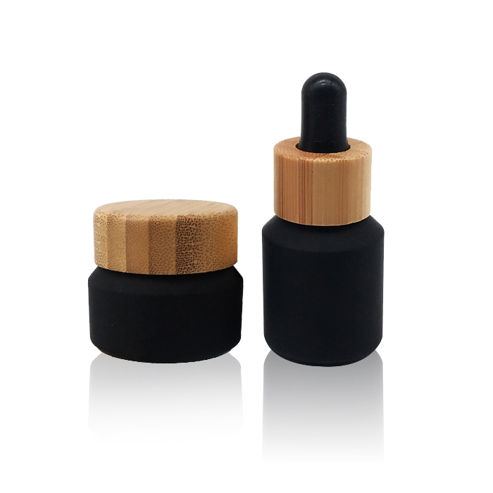 Factory wholesale cosmetic wooden lid glass cream jar glass black frosted cream jar with 100% nature bamboo cap