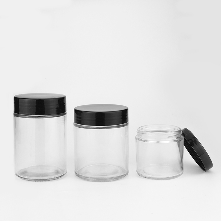 Fancy 1 2 3 4 6 8 10 oz clear weed packaging container jar cylindrical storage glass bottles jars with black plastic lid