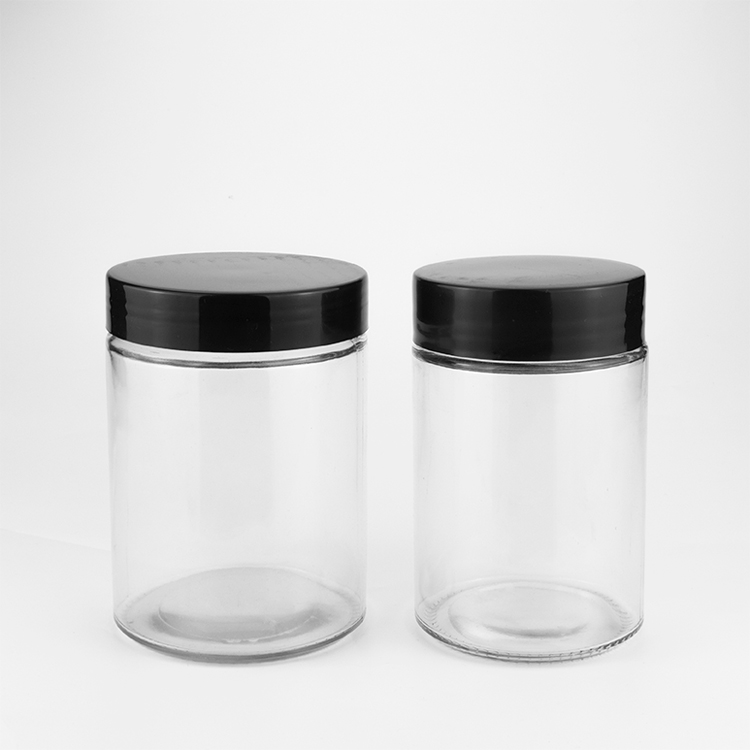 Fancy 1 2 3 4 6 8 10 oz clear weed packaging container jar cylindrical storage glass bottles jars with black plastic lid