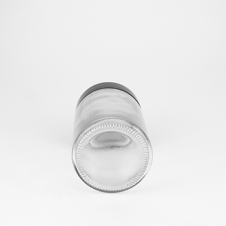 Fancy 1 2 3 4 6 8 10 oz clear weed packaging container jar cylindrical storage glass bottles jars with black plastic lid