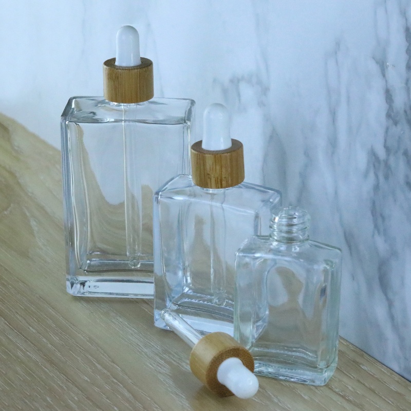 Fancy 30ml 50ml 100ml Square Cosmetic Clear Glass Dropper Serum Bottle With Bamboo Pipette Dropper (GSA23)