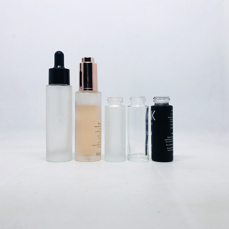 Fancy 30ml push button pump frosted thick cylinder glass cosmetic dropper packaging bottle with dropper or press pump