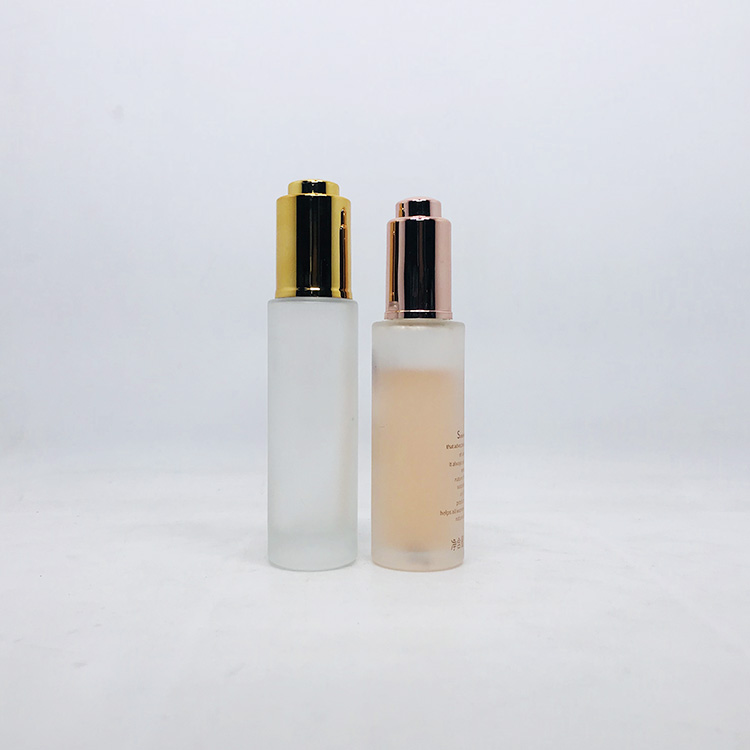 Fancy 30ml push button pump frosted thick cylinder glass cosmetic dropper packaging bottle with dropper or press pump