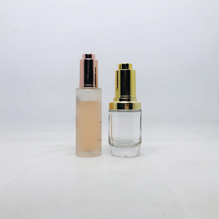 Fancy 30ml push button pump frosted thick cylinder glass cosmetic dropper packaging bottle with dropper or press pump