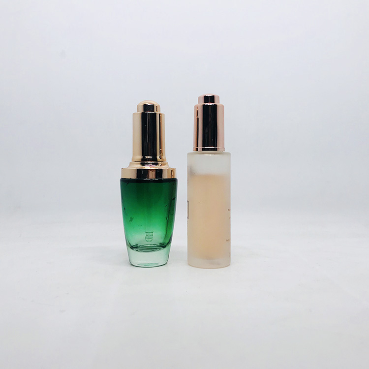 Fancy 30ml push button pump frosted thick cylinder glass cosmetic dropper packaging bottle with dropper or press pump
